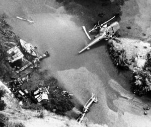 Aerial view looking down on the wreckage of helicopter which crashed into river bed on a movie location near Castaic, California on Friday, July 23, 1982 killing veteran actor Vic Morrow and two Vietnamese child actors with him. (AP Photo)